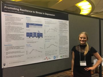 Alison Tracy presents her poster "The effect of self-compassion on emotional and biological recovery from stress in depression"